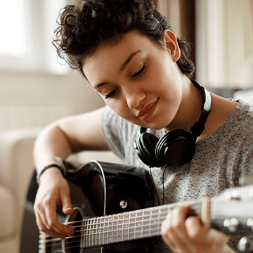 LeanIX Empowerment, Frau spielt Gitarre